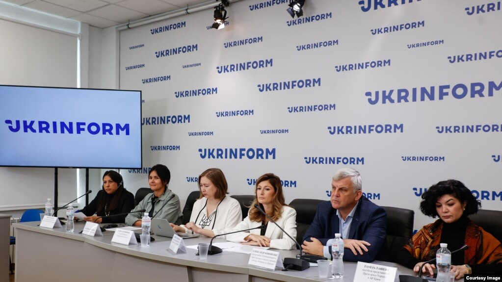 Kateryna Yesypenko, wife of imprisoned RFE/RL journalist Vladyslav Yesypenko, and RFE/RL Head of News Division Nicola Careem join a panel on Oct. 5, 2023.