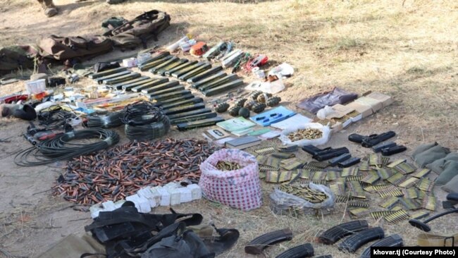 Photos of the weapons seized from the militants, such as bullets, magazines, guns, and others.