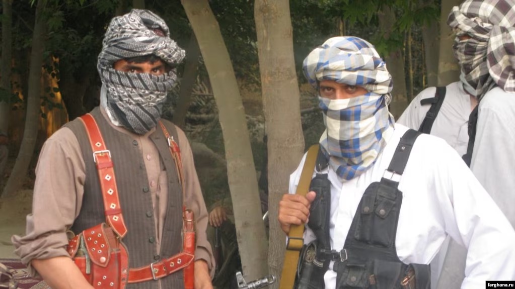 Militants of the Islamic Movement of Uzbekistan (IMU) pose for photo in the northern Kunduz Province.