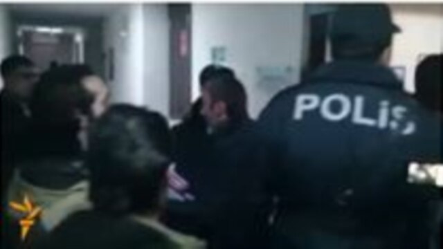 Azerbaijani agents raid RFE/RL's Baku bureau (December 26, 2014)